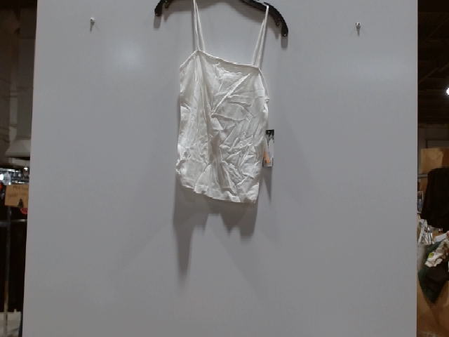 White Sleeveless Top