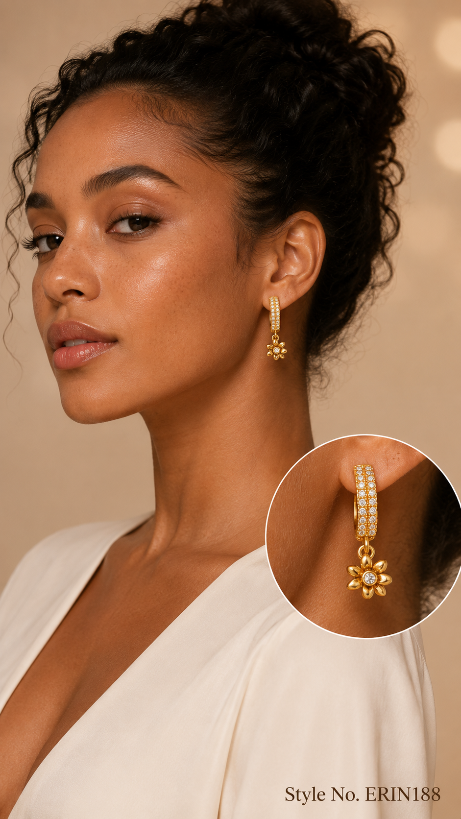 Gold tone paved huggie hoop earrings with floral charm drop