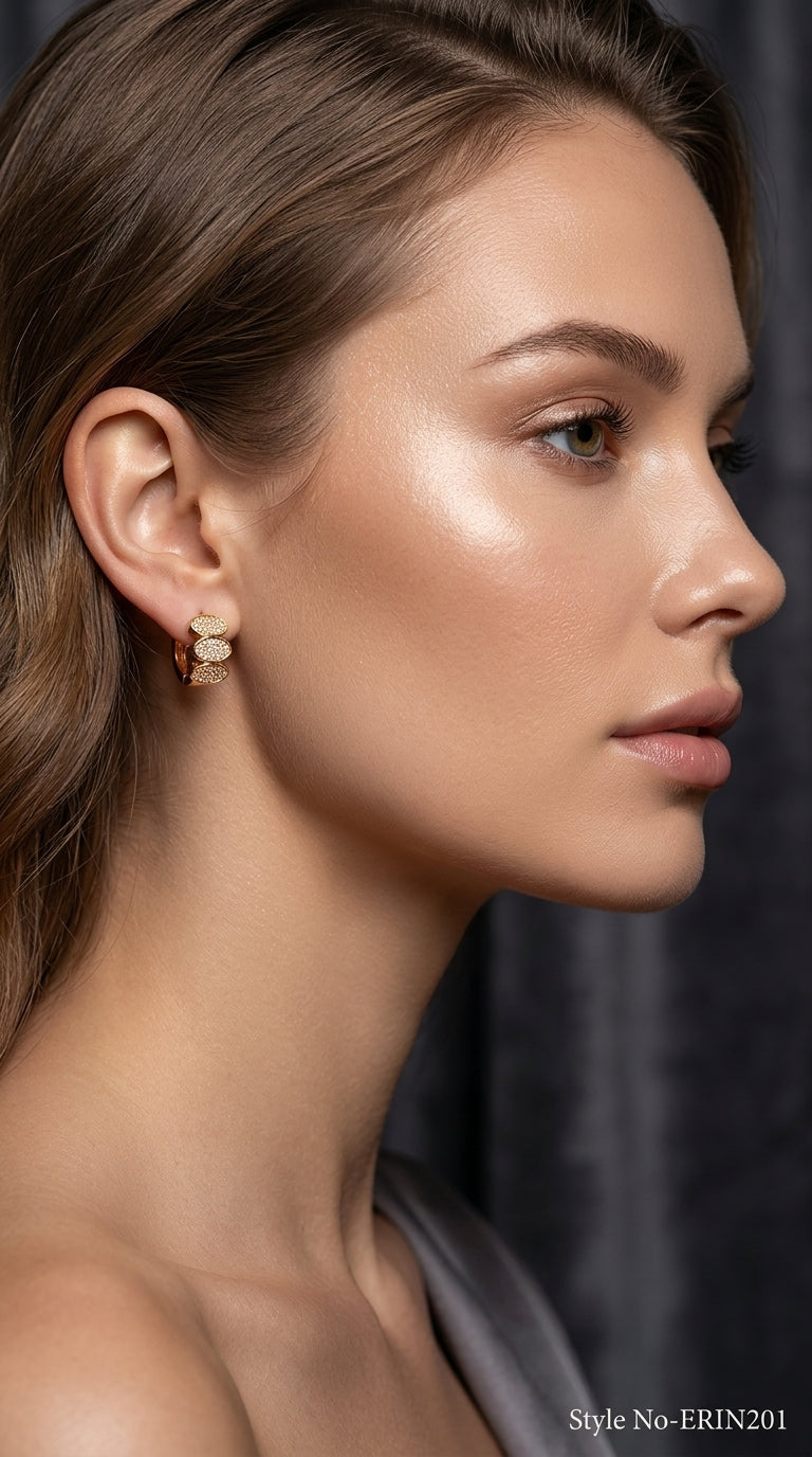 Gold tone triple oval paved cluster huggie hoop earrings