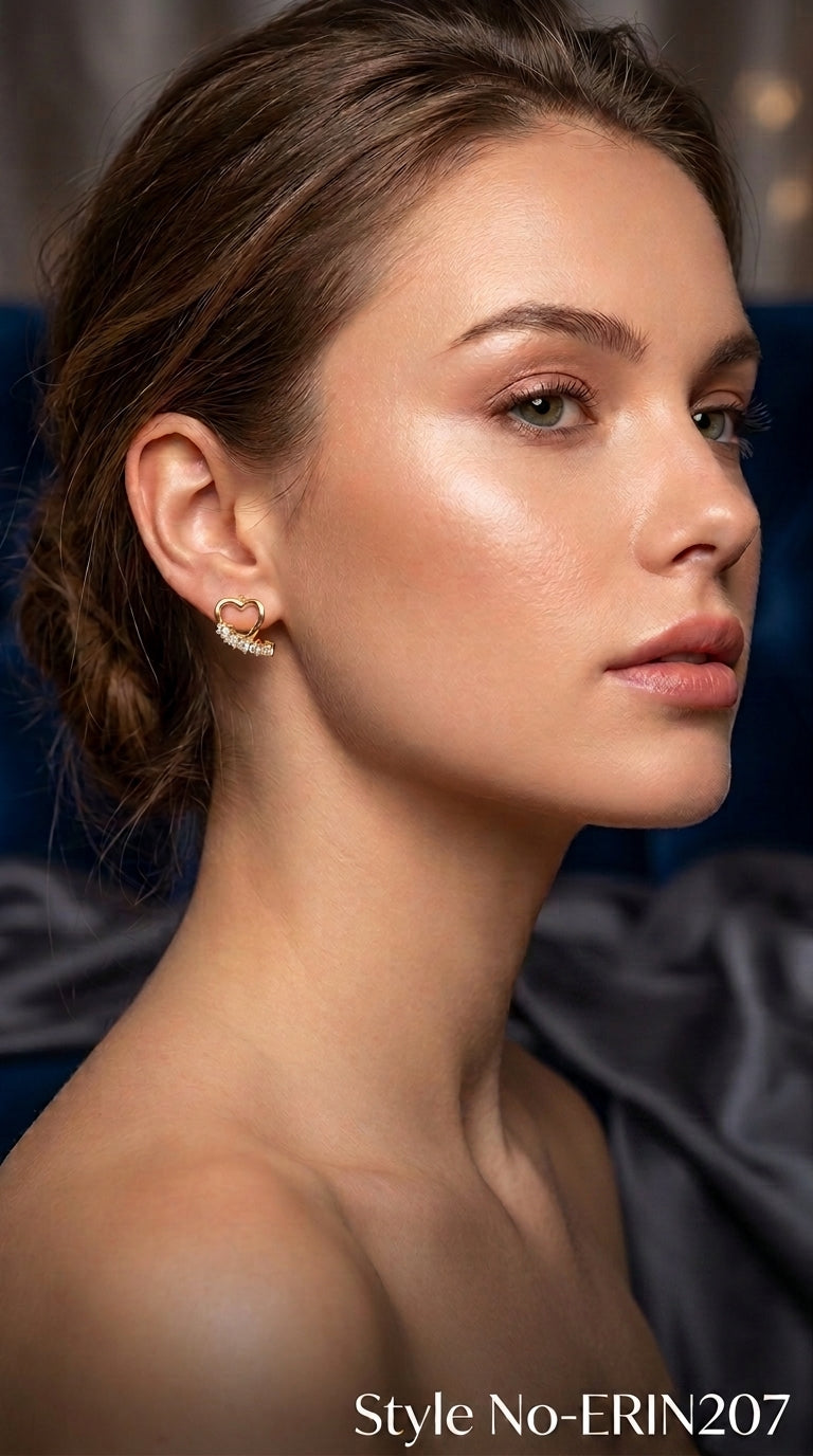 Gold tone open heart stud earrings with curved pave line