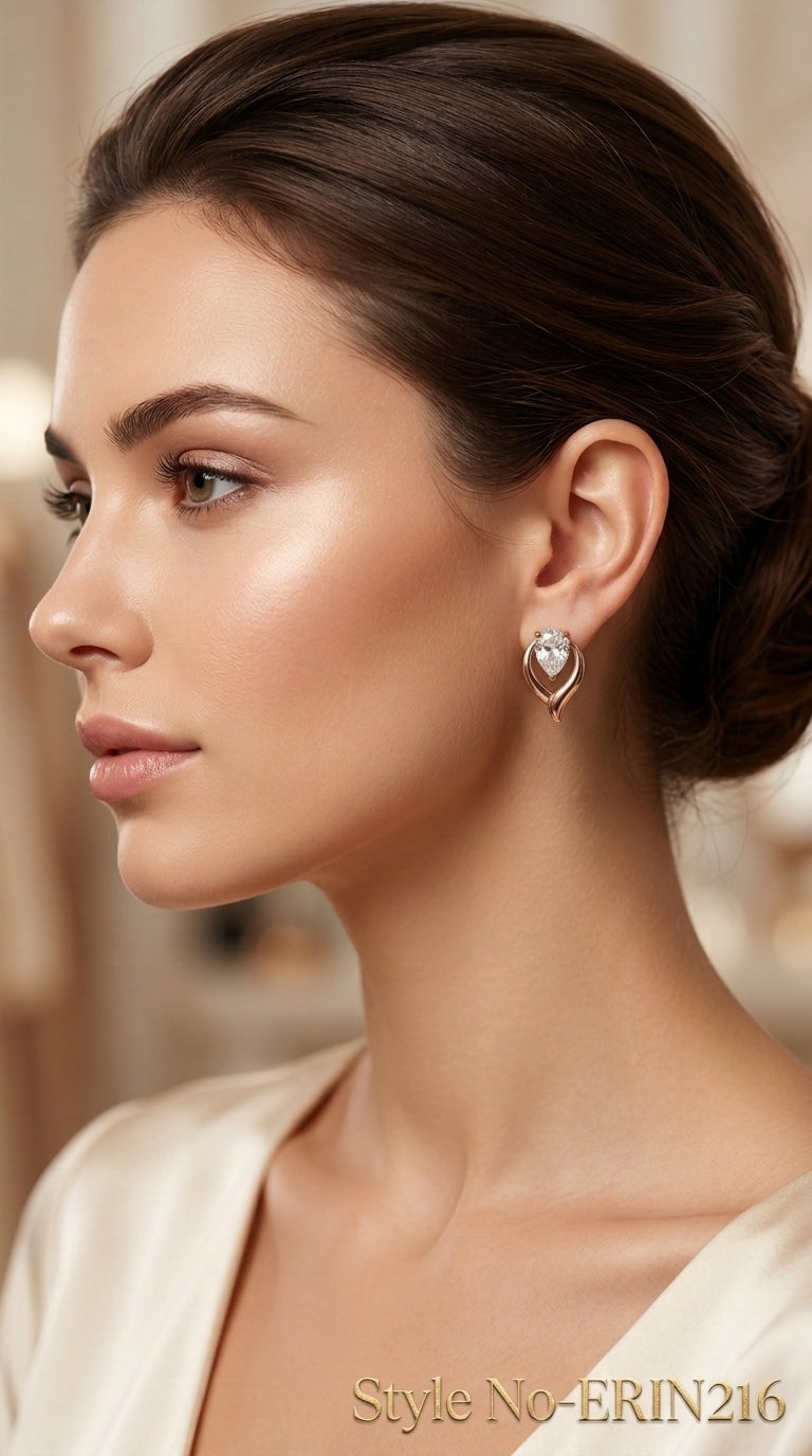 Gold tone pear cut solitaire stone curved frame stud earrings