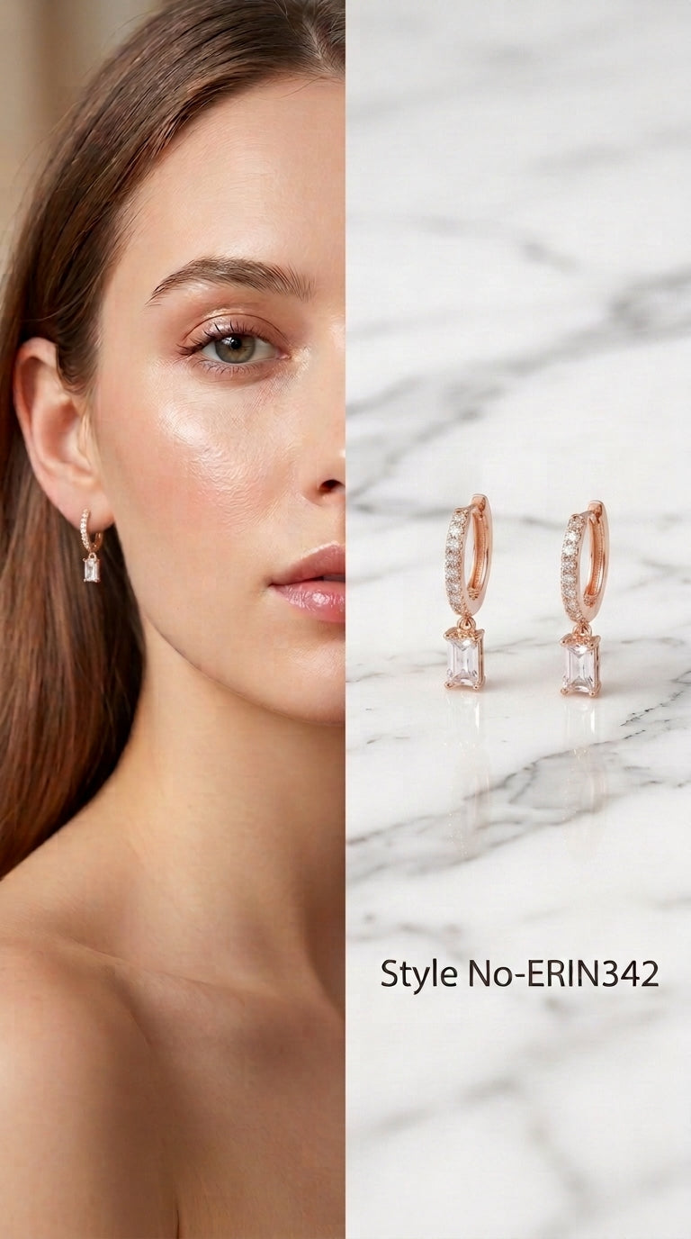 Pave front huggie hoop with dangling emerald cut baguette stone