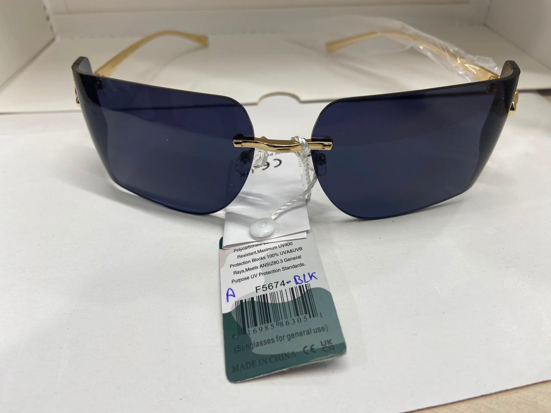 Gold and Smoke Black Rimless Y2K Wrap Shield Sunglasses