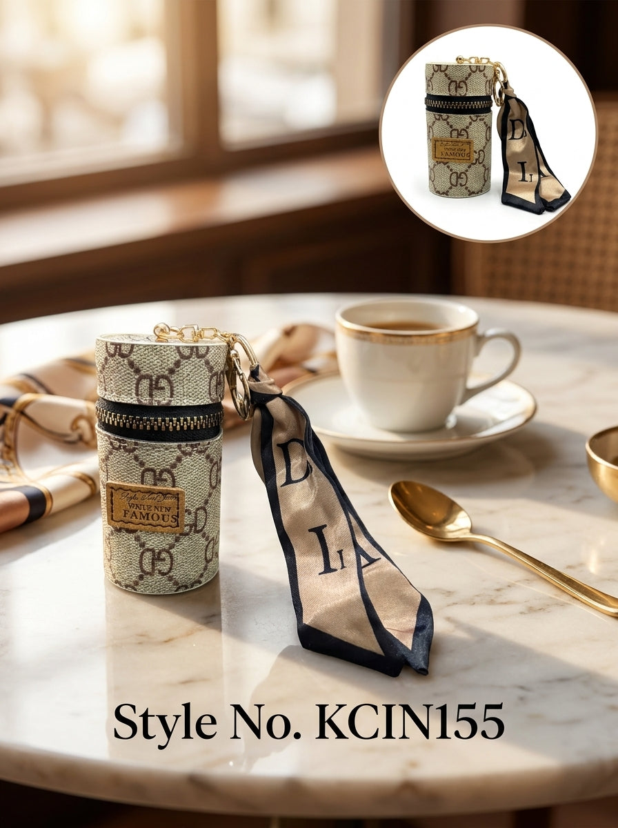Beige patterned cylindrical mini pouch with scarf tail Keychain | KCIN155