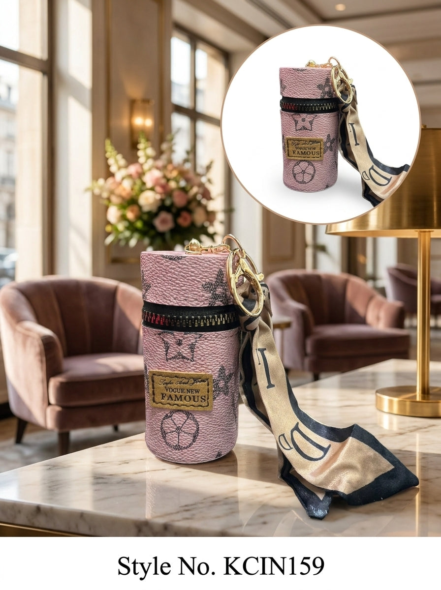 Pink cylindrical mini pouch with star pattern and scarf tail Keychain | KCIN159