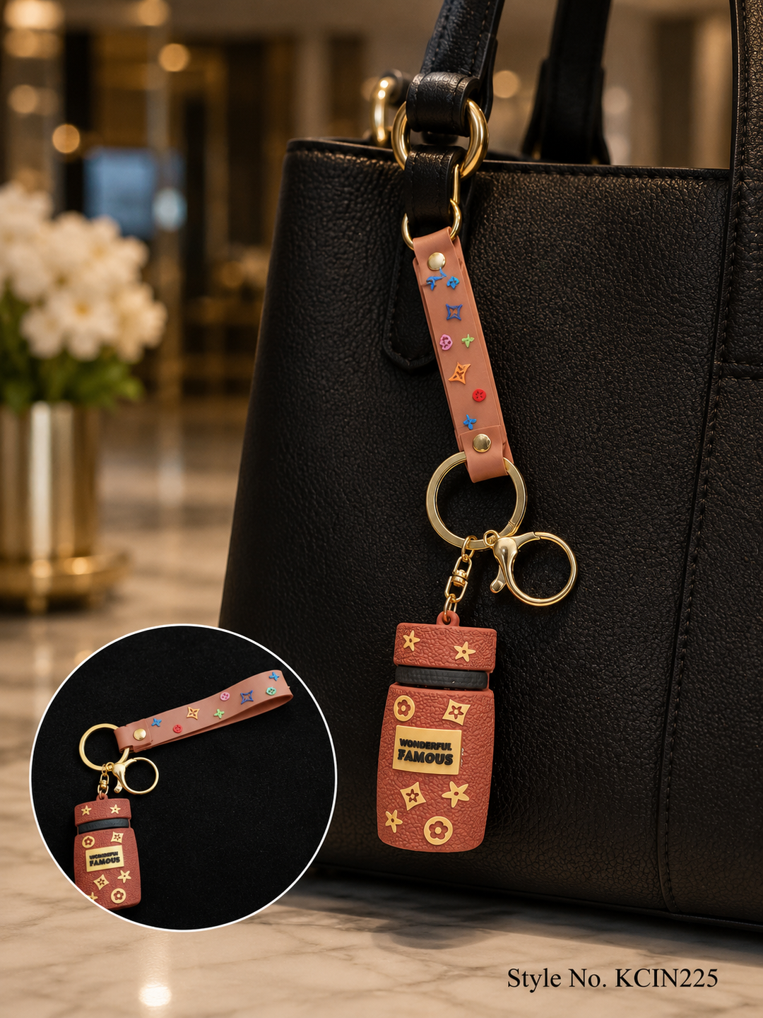 Pink wrist strap with tiny bottle charm Keychain | KCIN225