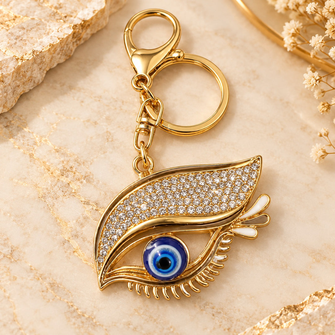 Gold-Tone Leaf Keychain with Blue Evil Eye Accent