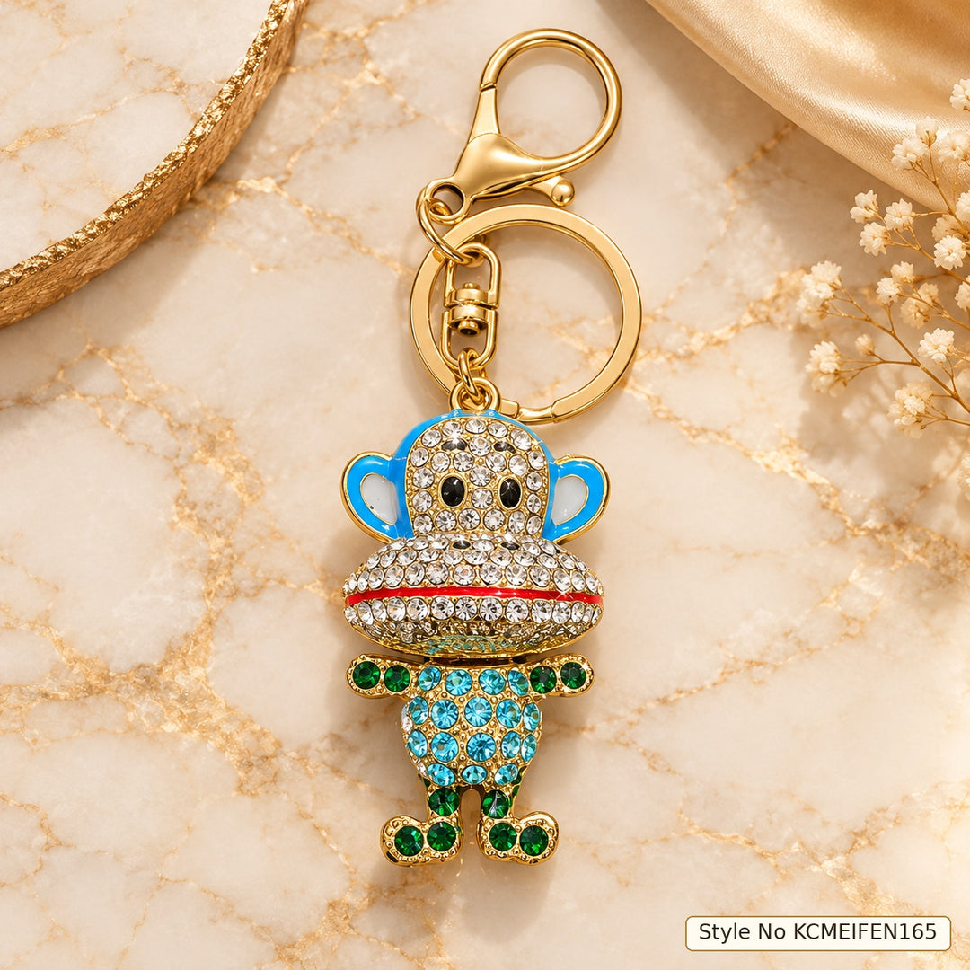 Monkey Character Keychain with Blue Outfit and Crown